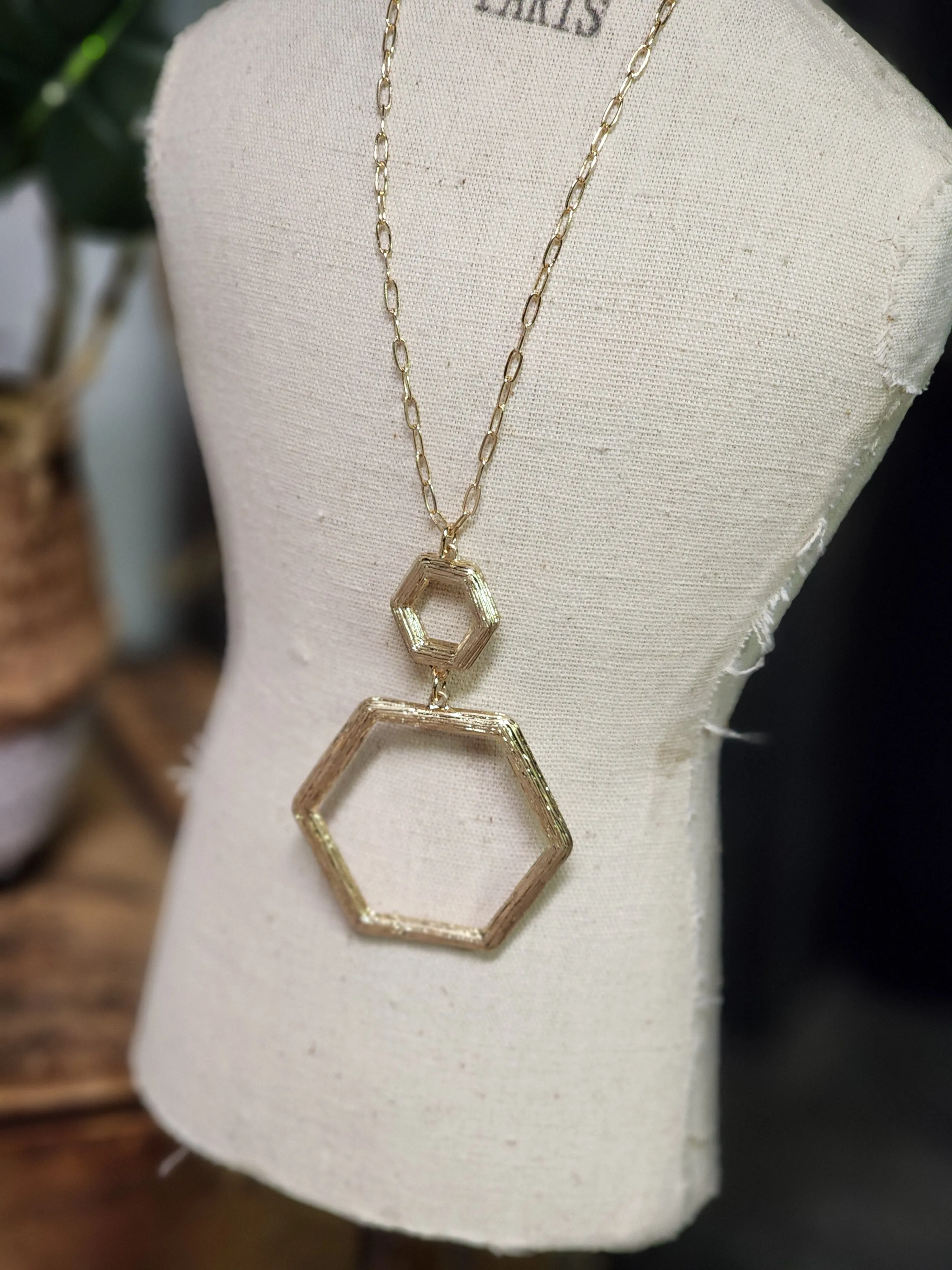 Gold hexagon necklace *