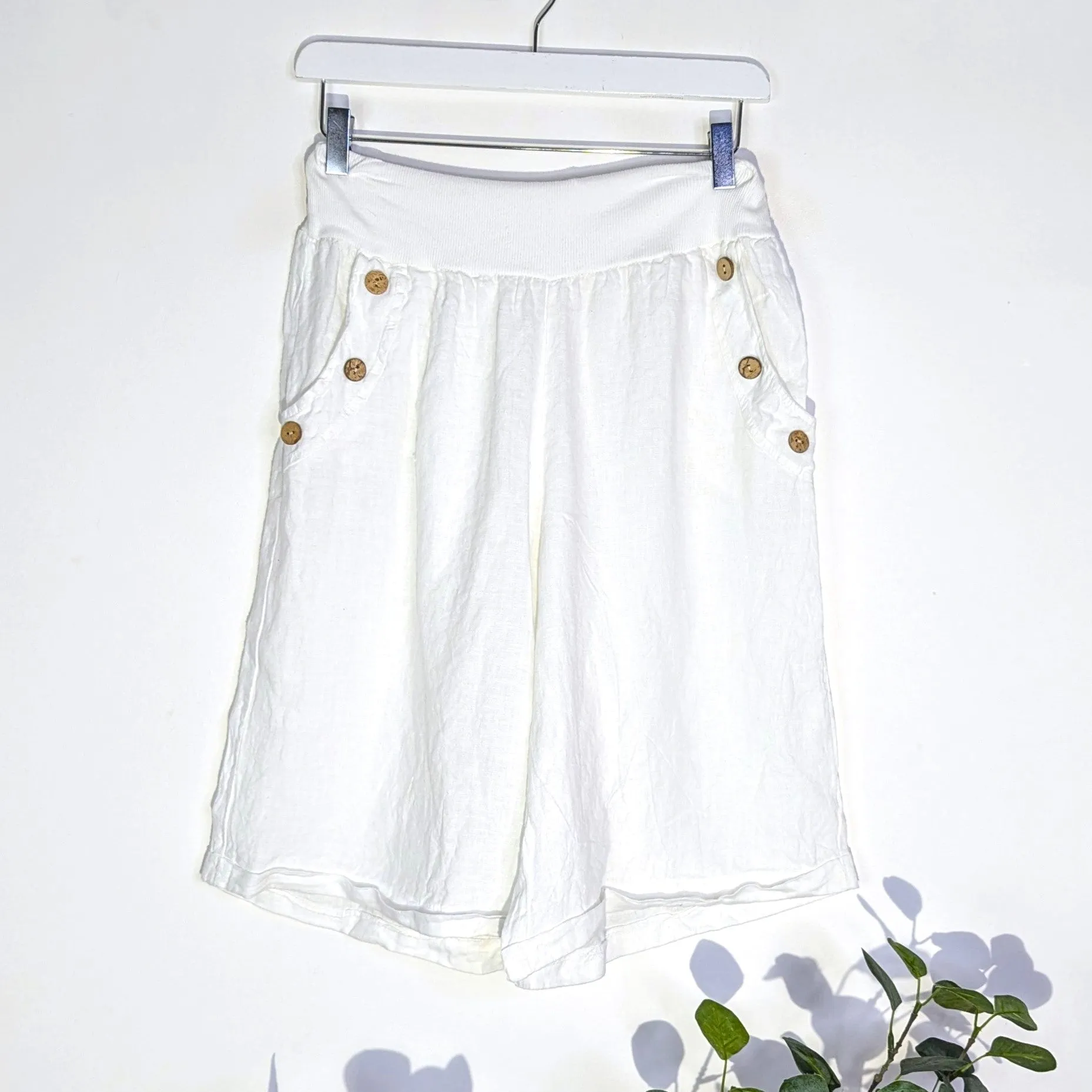 Long pure linen shorts with coco button pocket detail (M)