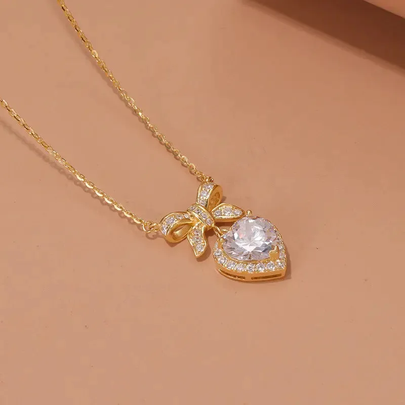 LOVCIA Gold Plated Sterling Silver Heart & Bow Pendant Necklace for Women with Sparkling Pink & Clear Gemstones