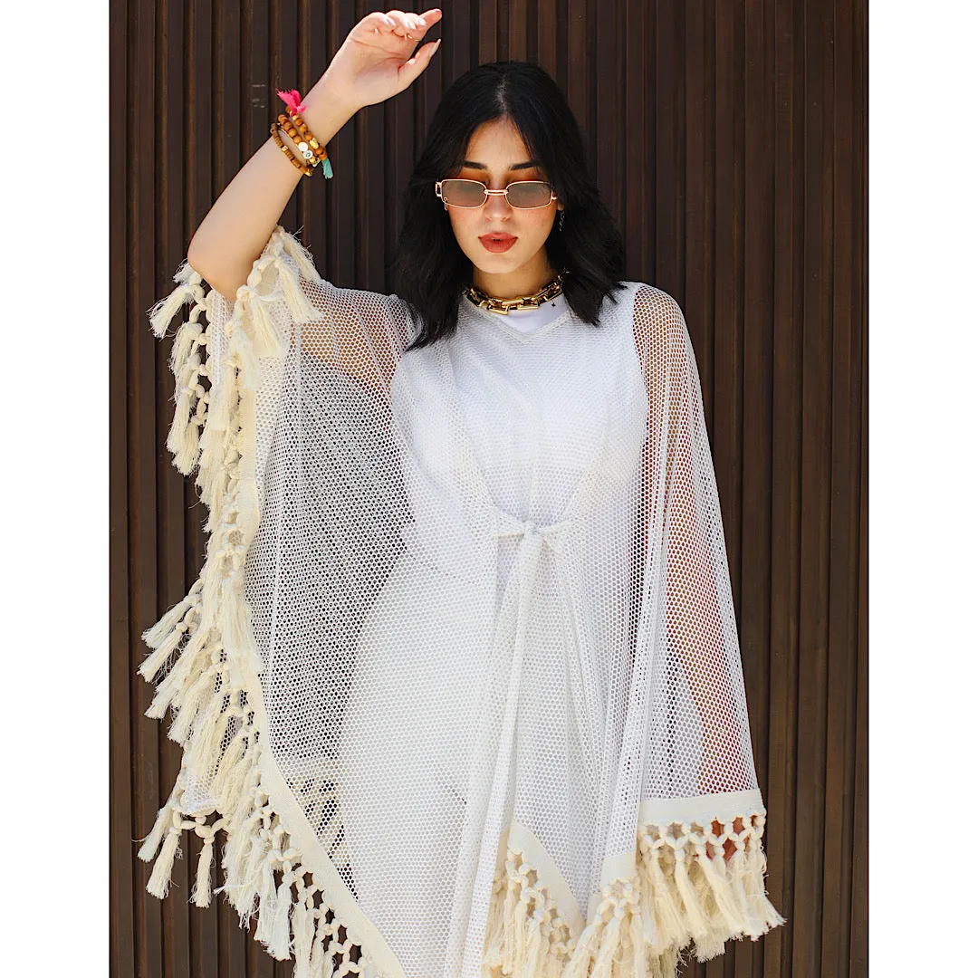 Open knit tasseled poncho